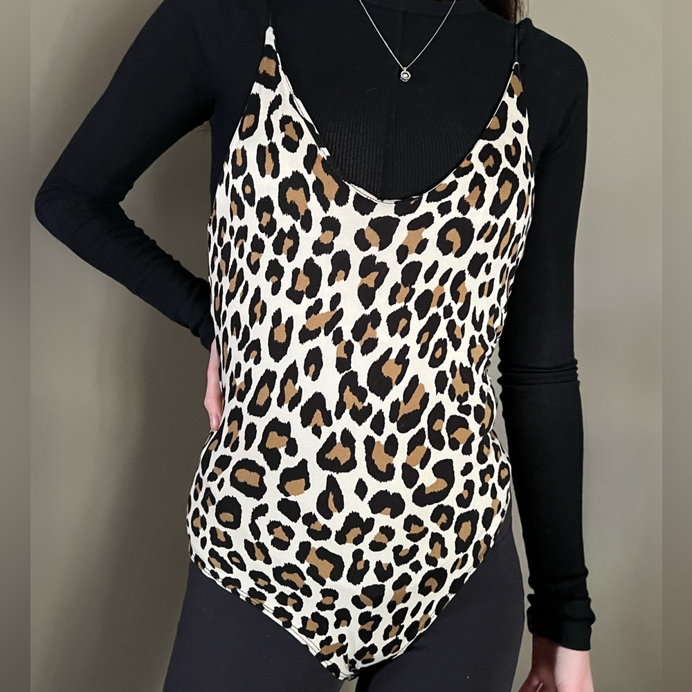 Gaze cheetah print bodysuit, size extra small, worn once
